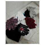 Group of new gloves and hat
