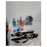Curling irons, vanity mirror and make up Sponges,