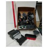 Group of electronics accessories includes chords,
