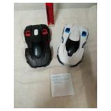 Two WowWee robotic enhanced vehicles
