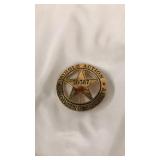 Single action shooting society badge