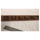17'x3' wooden bullet sign