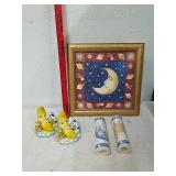 Moon statues, framed artwork and sun and moon