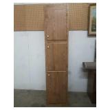 19'W X 85' TX 24'D 3 door cabinet has some damage