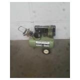 Sears one horse air compressor turns on