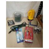 Group of household supplies includes USB cables,