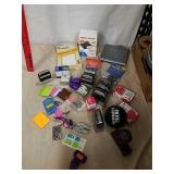 Group of office supplies includes labels stamp