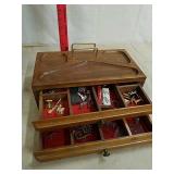 Vintage jewelry box with various jewelry