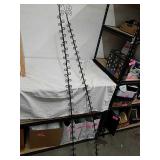 Pair of metal picture hanger racks flexible