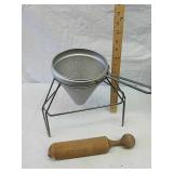 Vintage juicer on stand with wood press Vintage juicer on stand with wood press