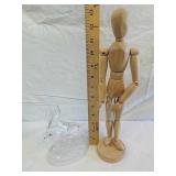 Glass horse statue and wood doll statue Glass horse statue and wood doll statue