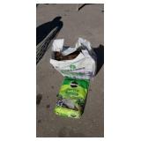 Bag of green mix and bag of miracle grow Bag of green mix and bag of miracle grow