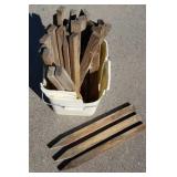 Bucket of wooden stakes Bucket of wooden stakes
