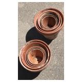 Group of terra-cotta planters various sizes Group of terra-cotta planters various sizes