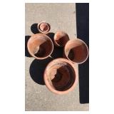 Group of terra-cotta planters various sizes Group of terra-cotta planters various sizes