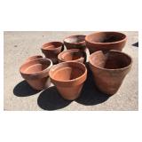 Group of terra-cotta planters various sizes Group of terra-cotta planters various sizes
