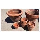 Group of terra-cotta planters various sizes Group of terra-cotta planters various sizes