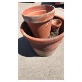 Large 15 inch tall terra-cotta planter with small Large 15 inch tall terra-cotta planter with small