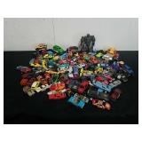 Large group of toy cars, of fidget spinner, and