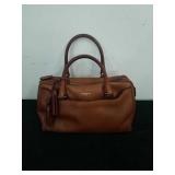 Coach purse has never been used or is very gently
