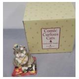 comic and curious cats statue comic and curious cats statue