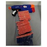 Nerf dual strike gun with lots of darts Nerf dual strike gun with lots of darts