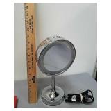 Lighted magnifying vanity mirror Lighted magnifying vanity mirror