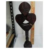 Wood carved African statue handcrafted in Ghana Wood carved African statue handcrafted in Ghana