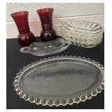 2ï¿½ red glass vases with glass plates and banana