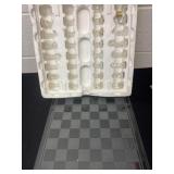 Glass chess board with game pieces