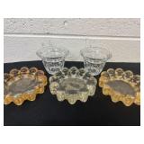 3 glass ash trays with 2 candle holders