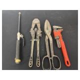 Pipe wrench, tin snips and metal cutter and air