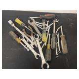 Group of wrenches and screw drivers