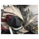 Tent with poles in tote, camel back and head