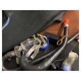 2 wet suits, goggles and snorkel.