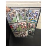 Binder of football cards