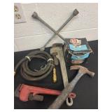 Nails, hammer, pipe wrenches