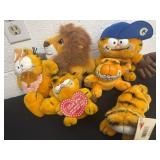 Group of Garfield plushies and lion