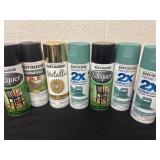 7 cans of spray paint almost all full