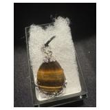 All nickel silver with African tiger eye pendant