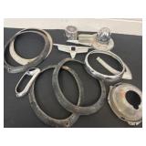 Head light trim pieces, tail light bracket hubs