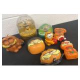 Garfield figures, snow gloves and candles