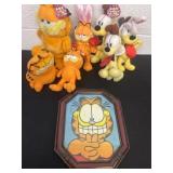 Group of Garfield plushies and photo frame