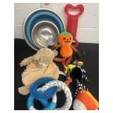 Group of dog toys and bowls