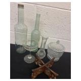 Group of glass bottles, vases and candy dish