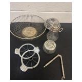Group of fruit basket, grinder, nut cracker,