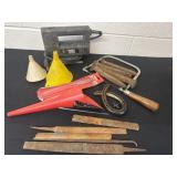 Saw, funnels, railroad ties and files