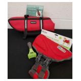 2 unused size M dog life jackets and a Furminator