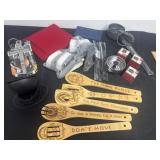 Group of kitchen items spoon knifes hot pads