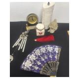 Group of home decor and fans and windchime